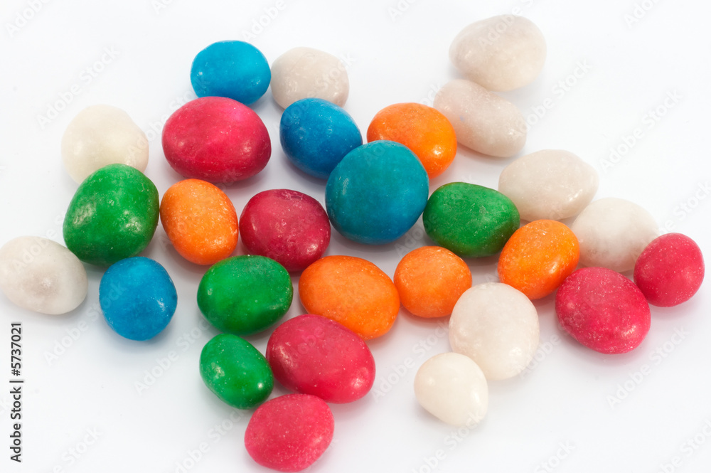 scatter multicolored icing glaze sweeties on white scatter multicolored icing glaze sweeties on white