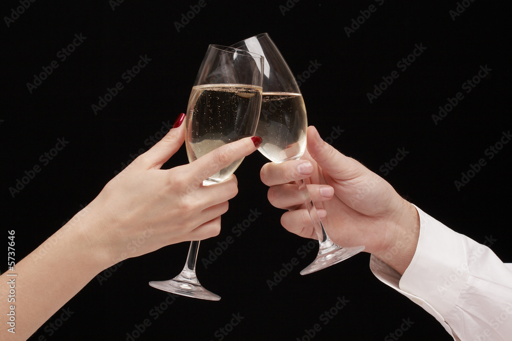 man and woman celebrating with Champagne, toast, party time man and woman celebrating with Champagne, toast, party time