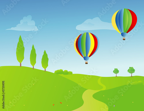 a pair of hot air balloons over a springtime rural landscape