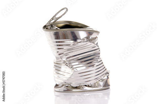 Empty twisted metal can over white background