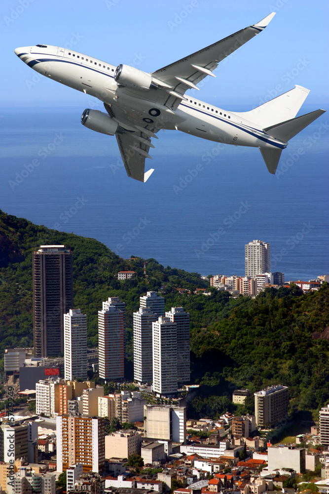Airplane over Ipanema beach in Brazil Airplane over Ipanema beach in Brazil