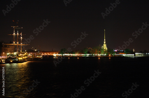 night view on illuminated ship and petropavlovskaya krepost photo