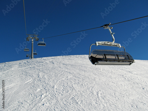Ski lift chair on a winter bright day © Sunlove