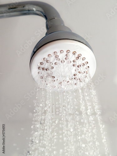 Water pouring from a metallic shower head