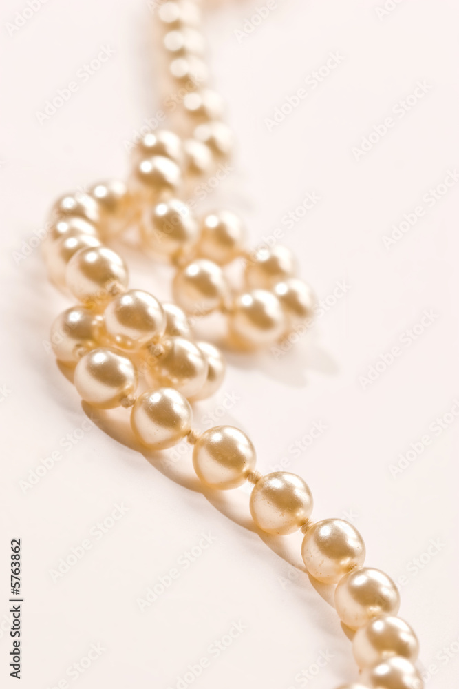 White beads on a white background, Venetian pearl