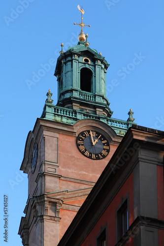 Stockholm Clock Tower in old town on blue sky. Sweden