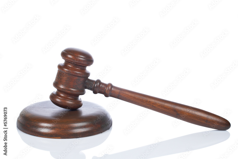 Wooden gavel from the court reflected on white background Wooden gavel from the court reflected on white background