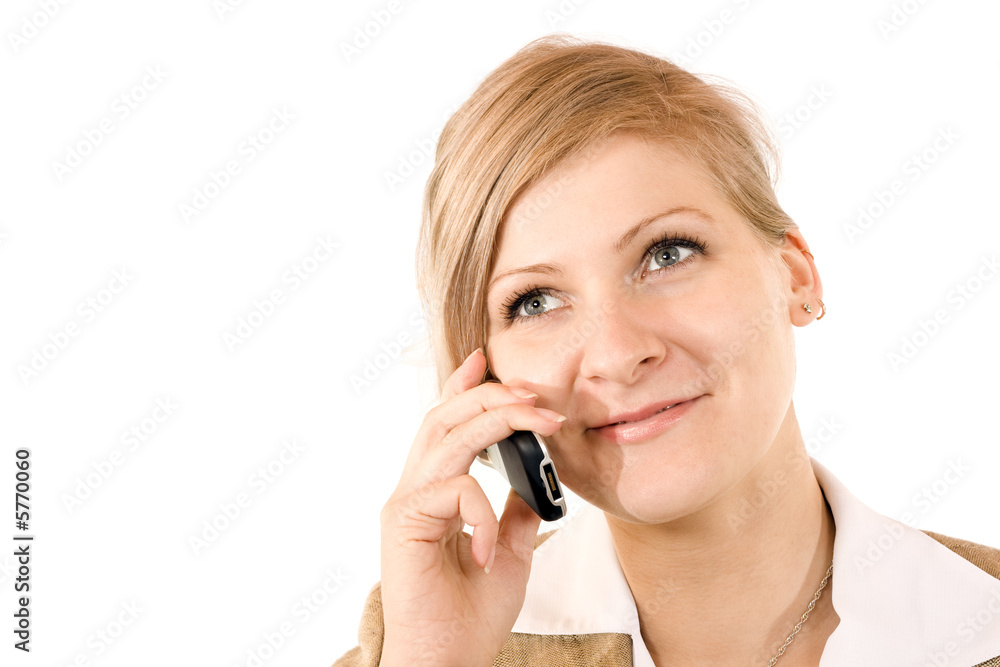 Blonde girl talking by mobile phone. Isolated on white. Blonde girl talking by mobile phone. Isolated on white.
