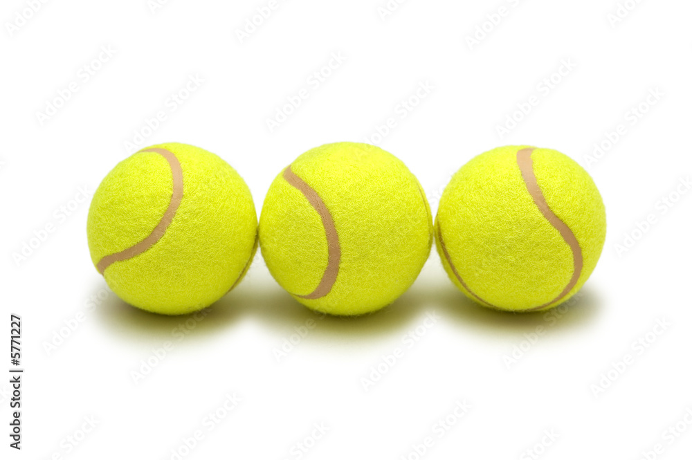 Three tennis balls isolated on the white