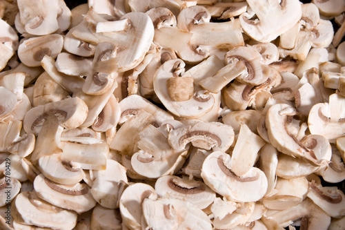 Cuted fresh mushrooms. Food background.