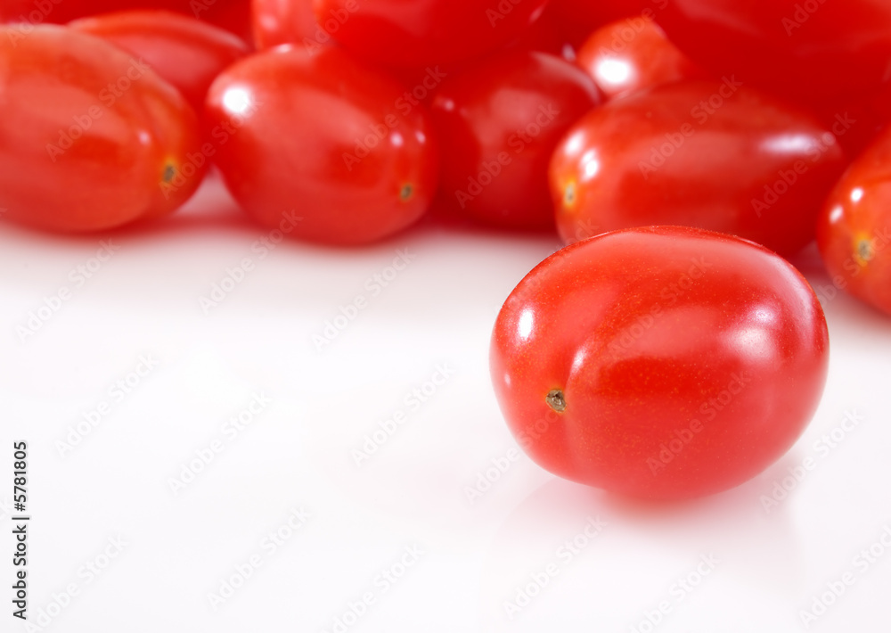 Close up of a group organic grape tomatoes Close up of a group organic grape tomatoes