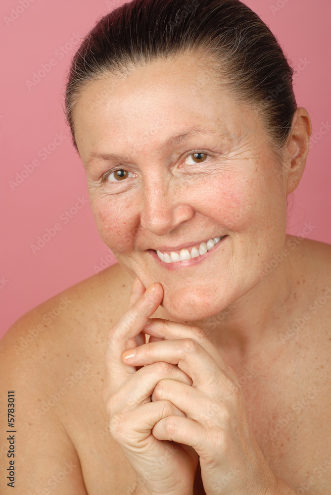 Attractive older woman laughing while in the nude Stock Photo Adobe Stock