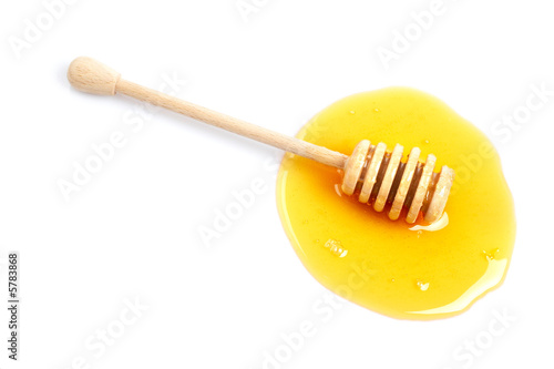 Honey  with soft shadow on white background. Shallow DOF