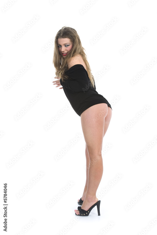 Beautiful girl in black dress on white background Beautiful girl in black dress on white background