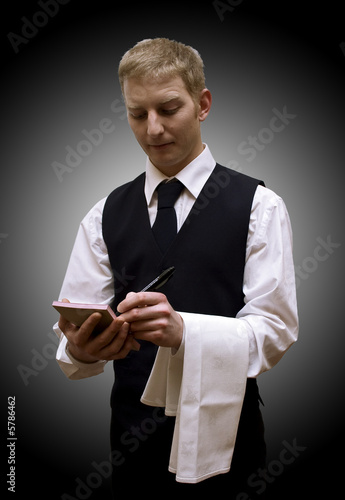 Waiter with notepad