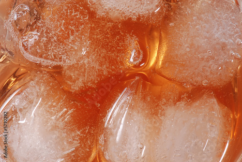 Whisky with ice in closeup