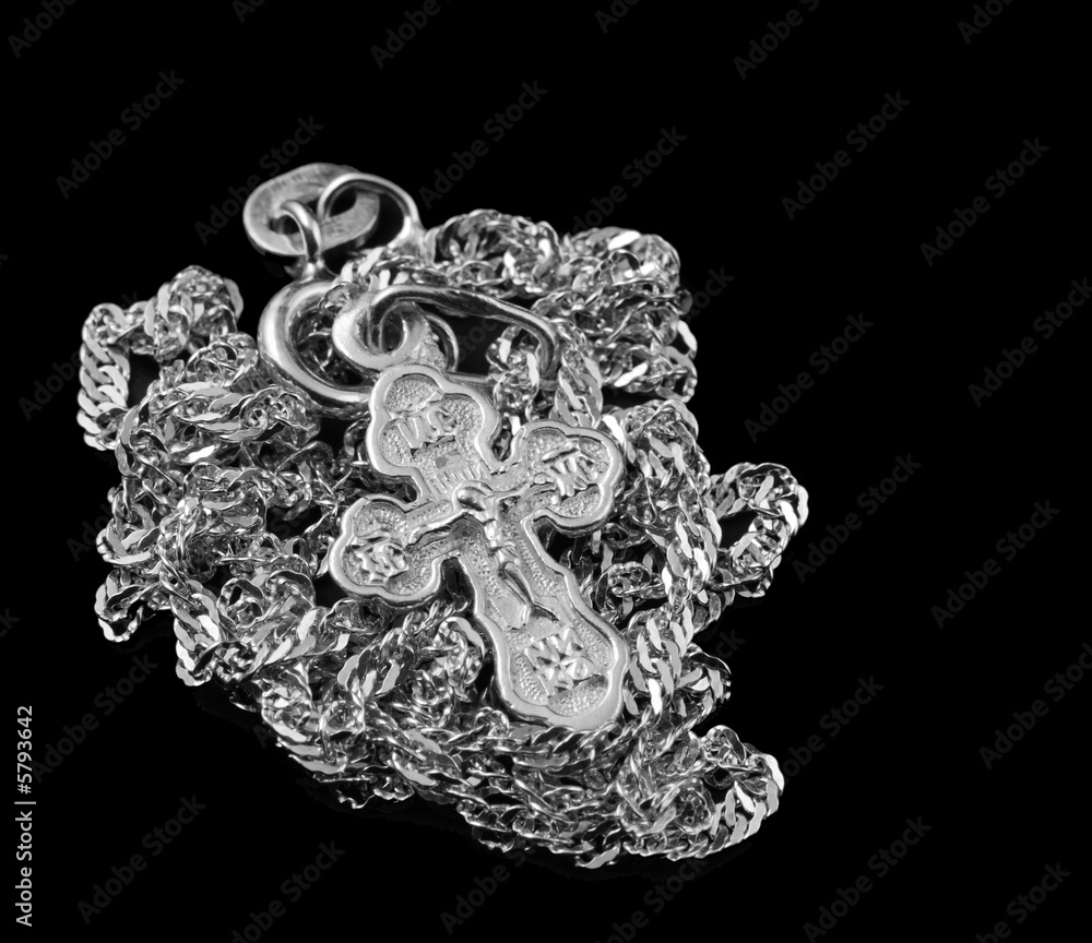 Obraz premium Silver chain with a dagger. The crucifixion