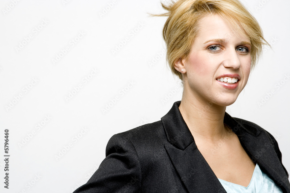 Attractive blonde female with white background.