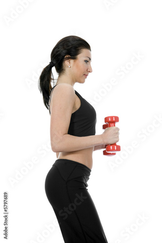 beautiful girl with dumbbells on isolated background