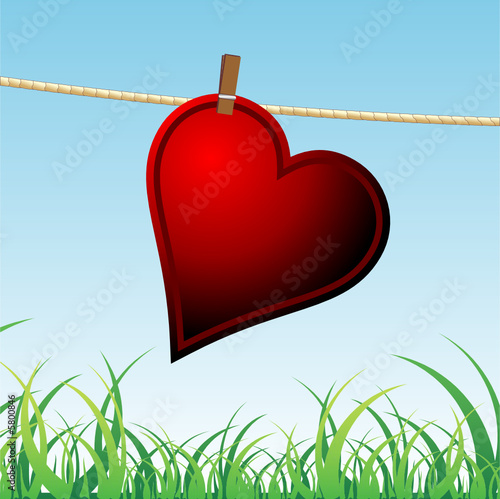 Lonely heart hanged on a rope waiting for love