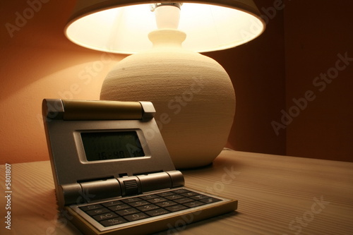 table lamp and a travel clock photo