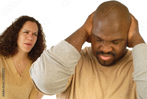 Man shutting his ears and not listening to nagging