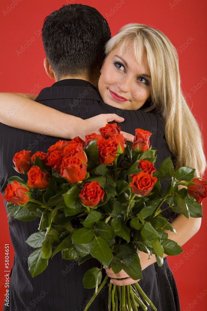 Young couple in happy hug. Young couple in happy hug.
