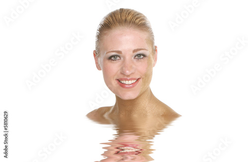 Pretty blond woman in water