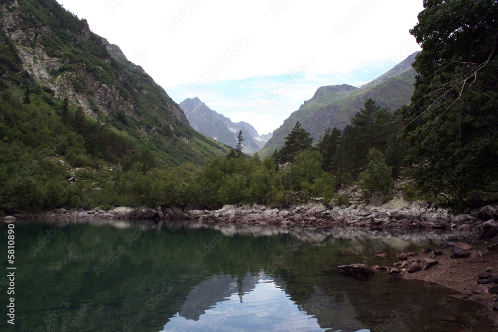 stoned shore of lake Baduk, Caucasus.