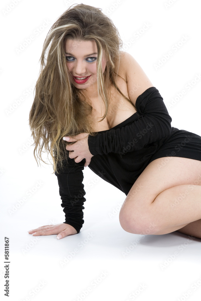 Beautiful girl in black dress on white background Beautiful girl in black dress on white background