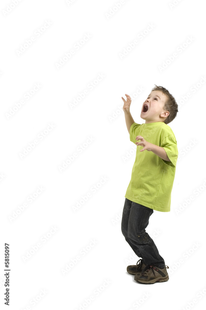 This boy is very scared. Against a white background. This boy is very scared. Against a white background.