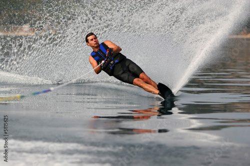 Advanced waterskiing on a mono-ski photo