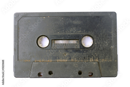 Old black and dirty 80's audio cassette tape .