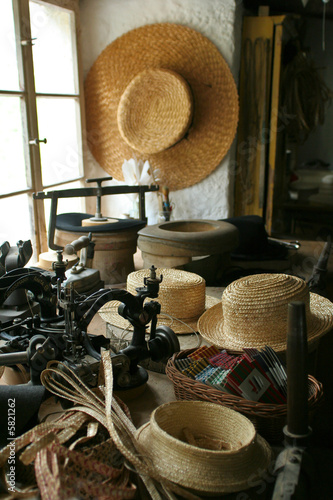 Old Sewing Machine and Straw Hats