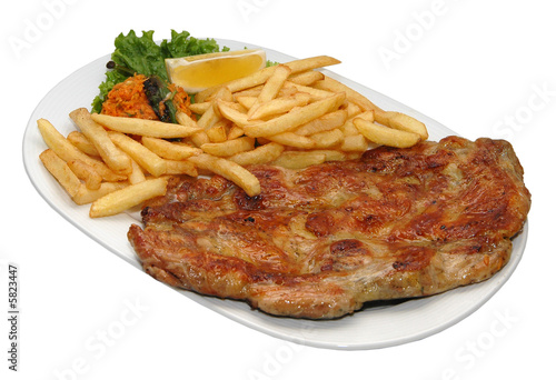 Fresh steak with potatoes and lettuce