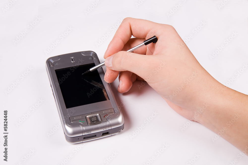 smartphone with businesswoman's hand ready to plan a meeting smartphone with businesswoman's hand ready to plan a meeting