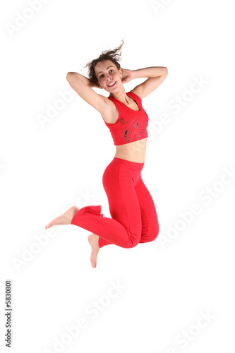 Fototapeta Naklejka Na Ścianę i Meble -  sport young woman jumping isolated on white