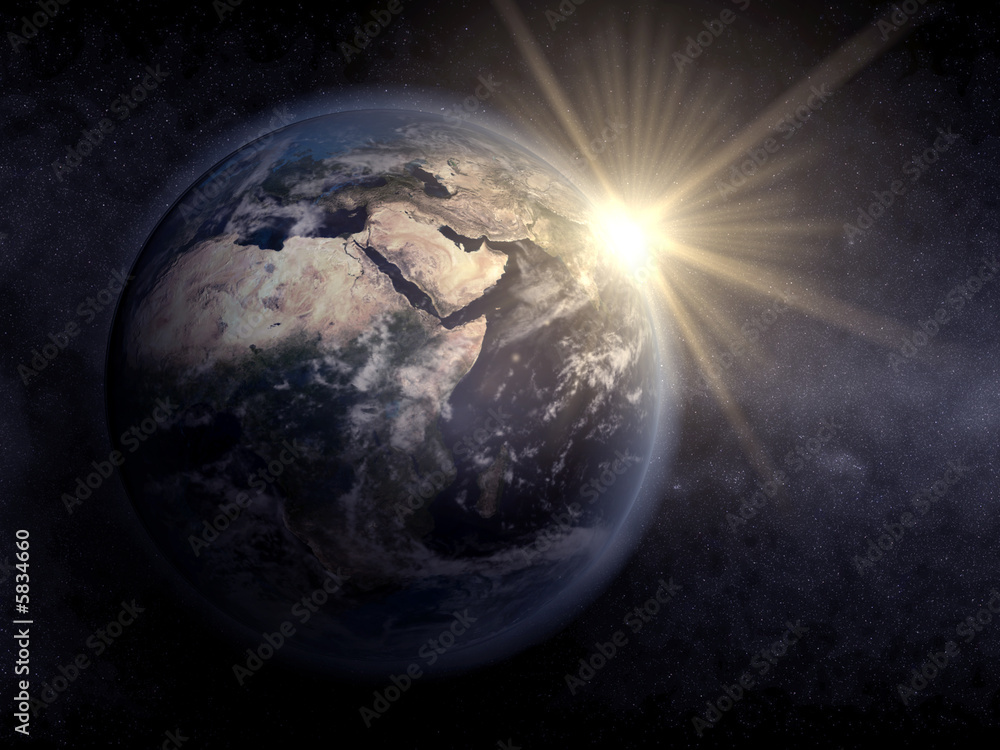 Fototapeta premium Sunrise behind the earth