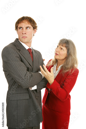  Businesswoman trying to explain to a stubborn employee. 