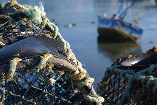 lobster keepnets & fishing boat in Brittany