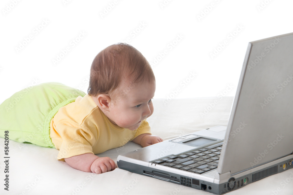 Small baby with laptop