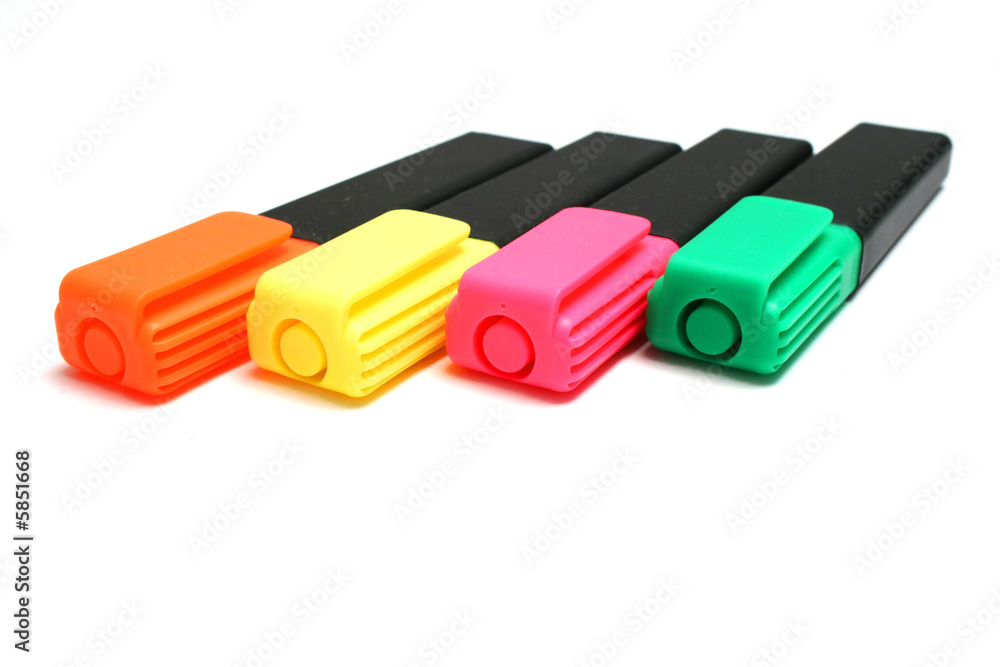 green, yellow, pink and orange highlighters (isolated)