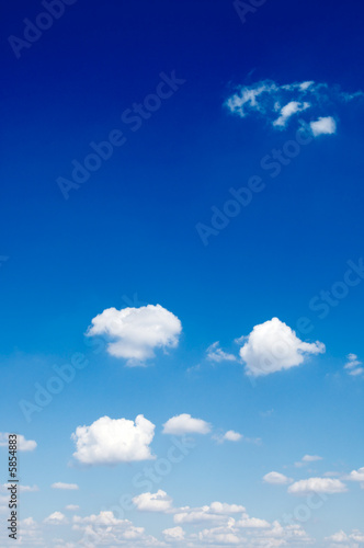 The beautiful white clouds on background blue sky.