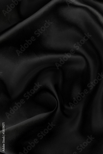 Majestic black silk textile background. 