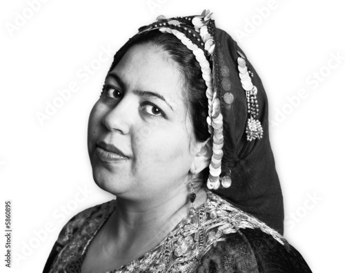 Portrait of a Muslim Woman in an Ornate Head Scarf photo