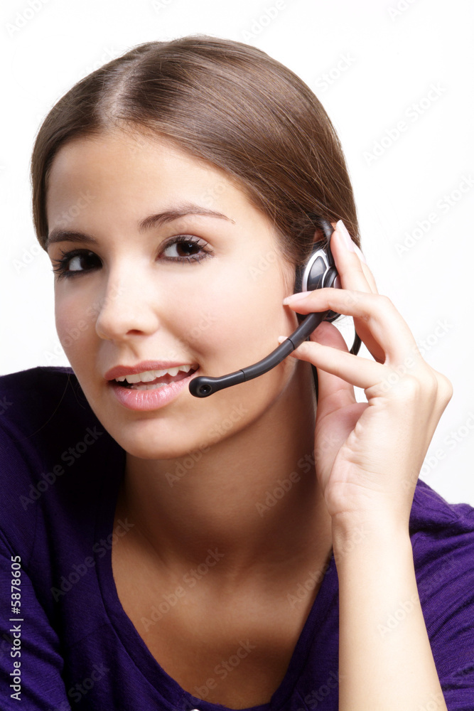 a young woman with brown hair and headset a young woman with brown hair and headset