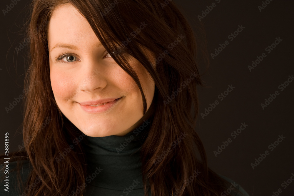 Portrait of young beautiful woman on black background Portrait of young beautiful woman on black background