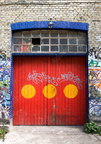 Photography A door in Christiania - an area of Copenhagen, Denmark
