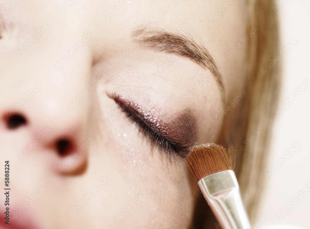 Eye - woman applying make up