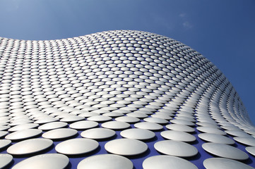 Detail of modern building with metallic disks
